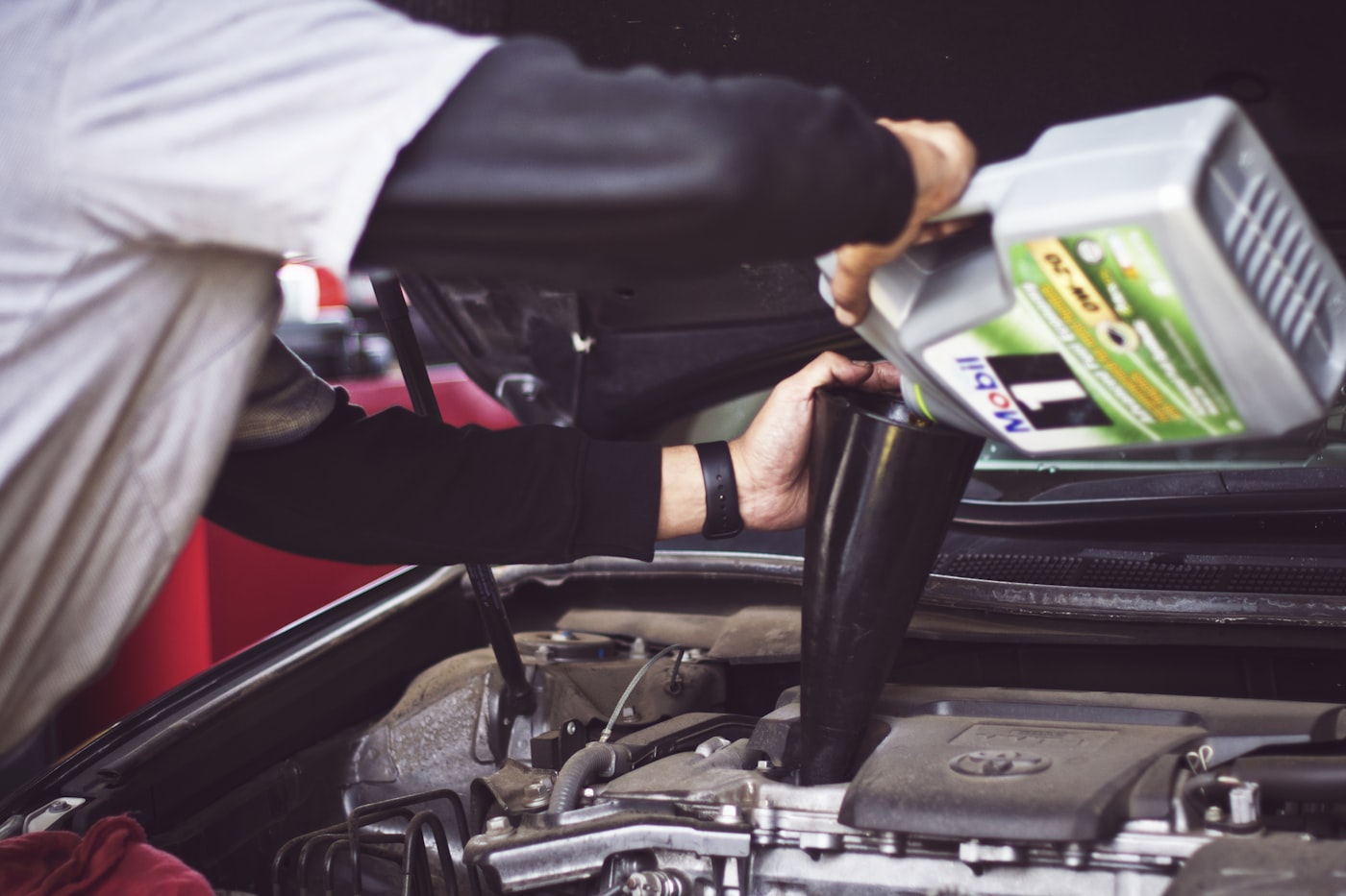 Mechanic working beneath a vehicle
